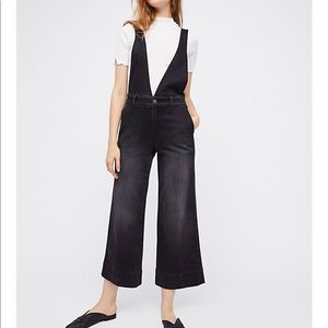 Free people black bell bottom overalls.